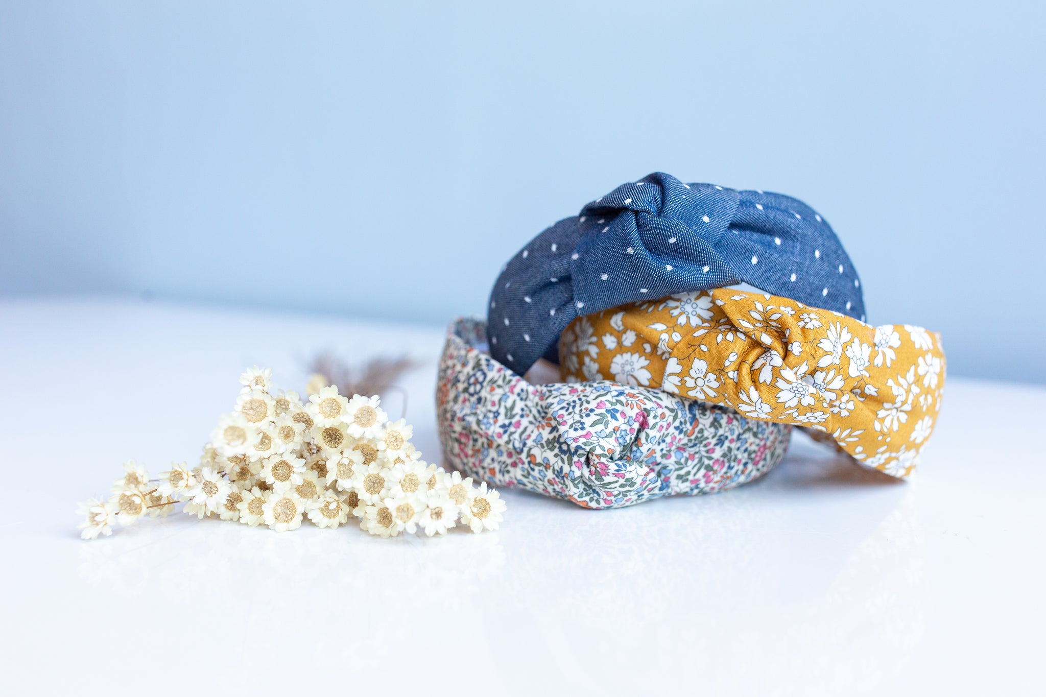 stack of three knotted headbands