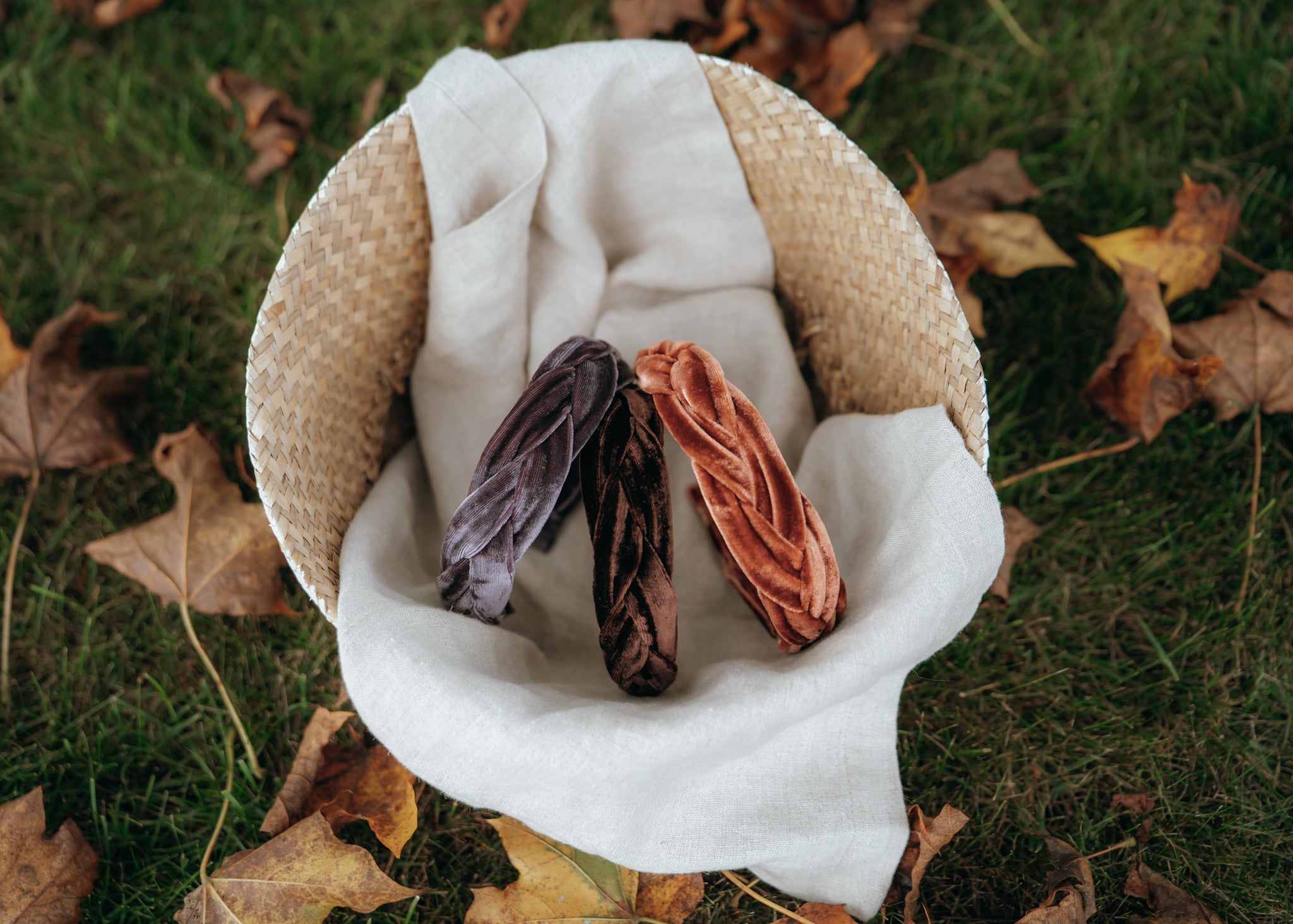 three velvet headbands surrounded by confetti