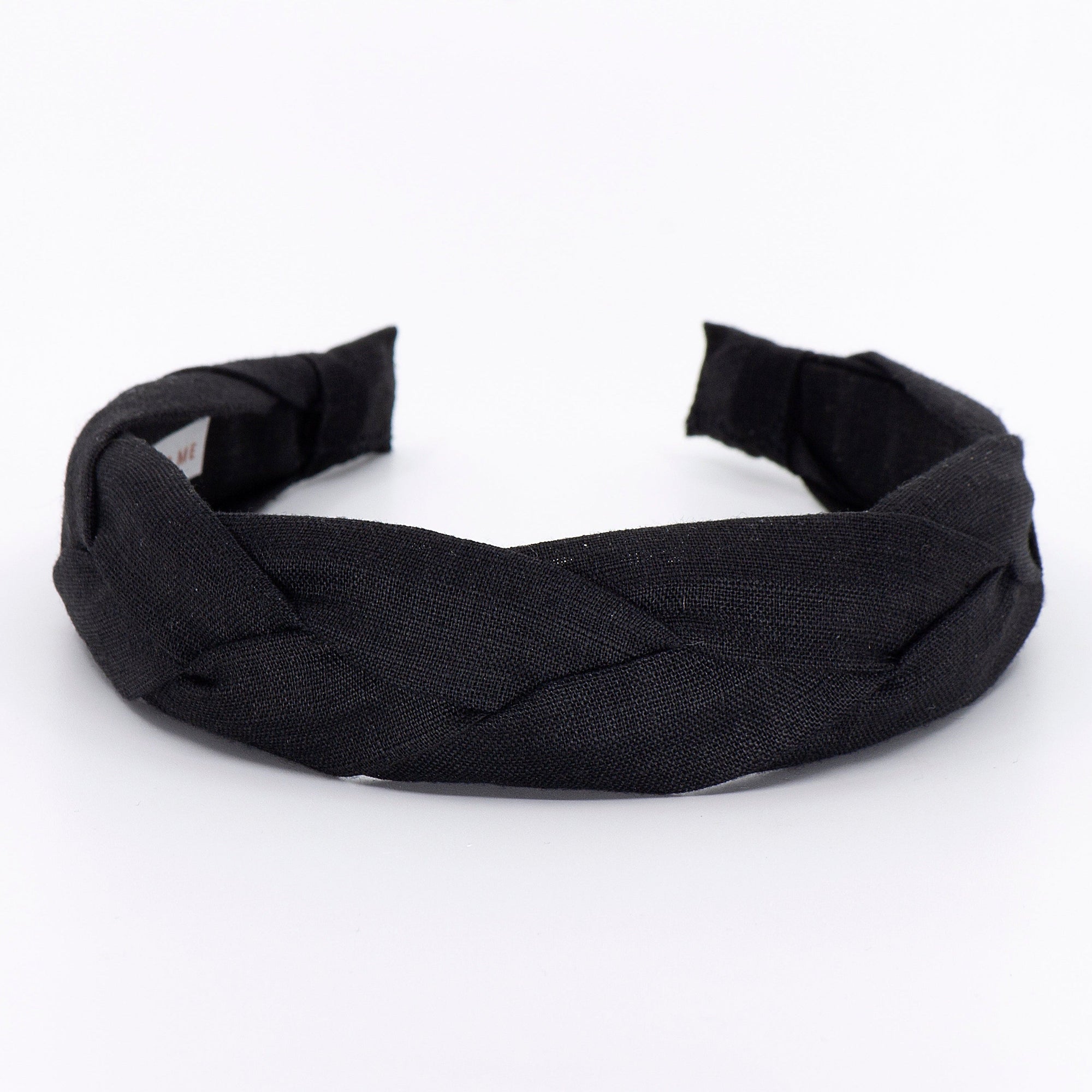 black braided headband on a white background