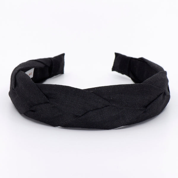 black braided headband on a white background