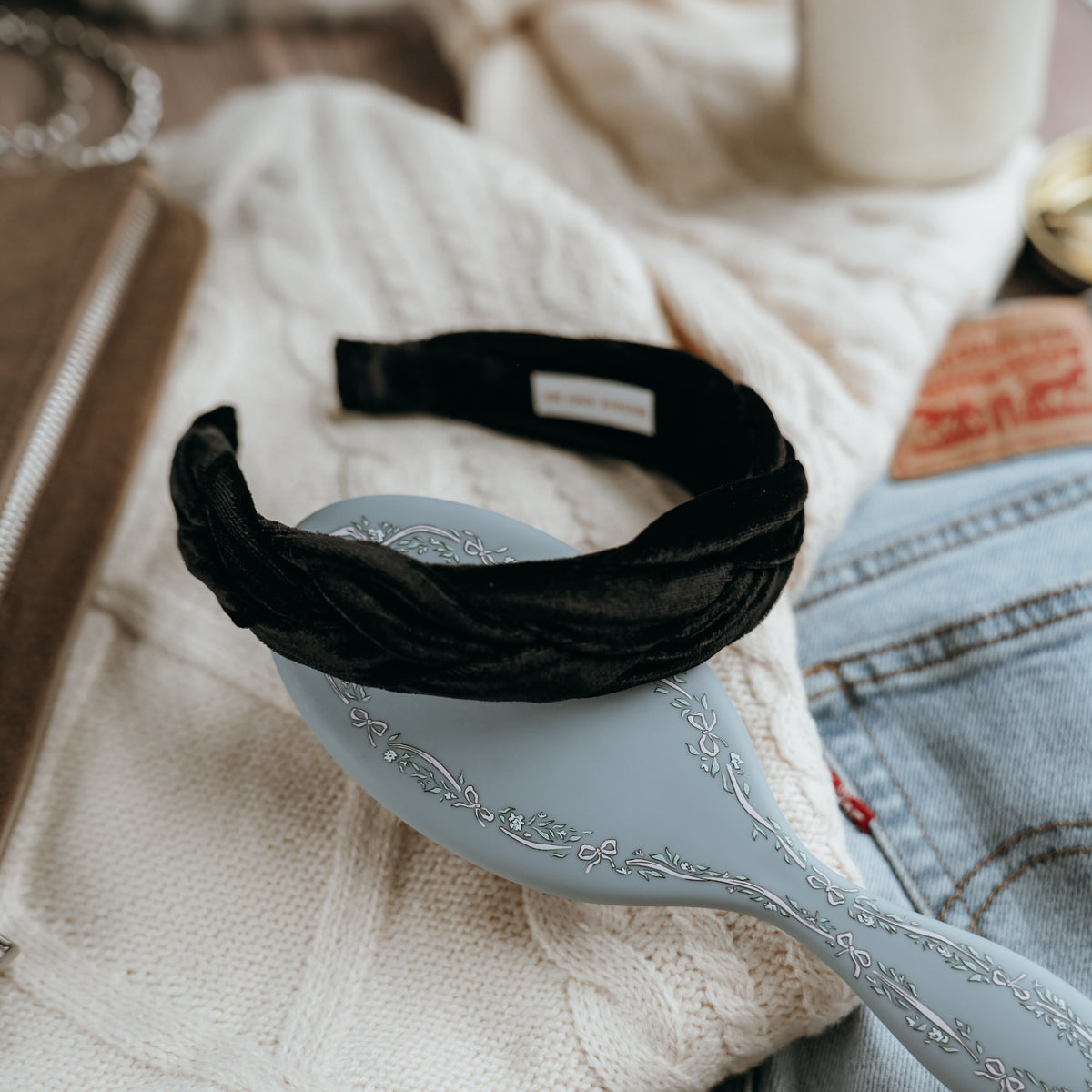 Black headband on a decorative spoon with a blurred background