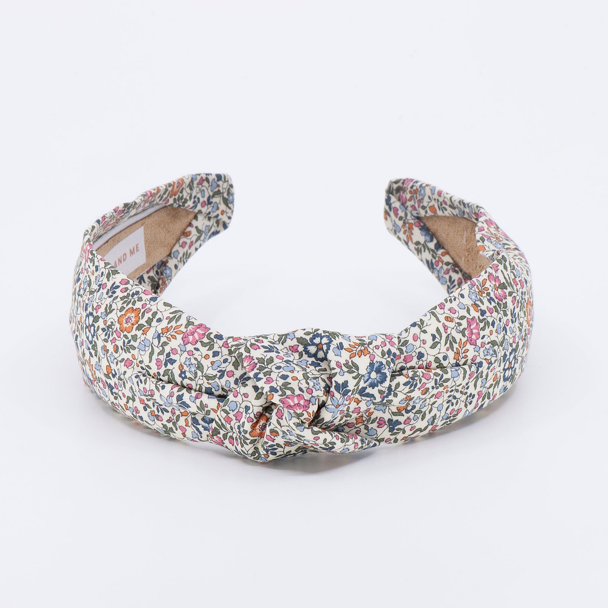 floral knotted headband on a white background