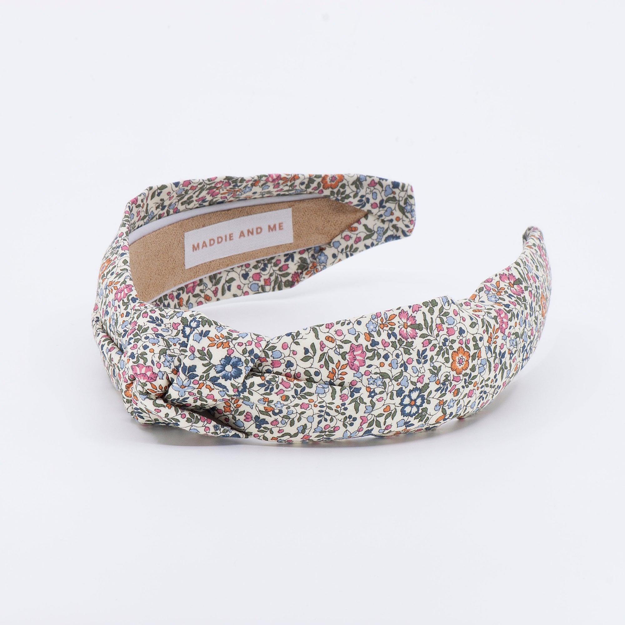 floral knotted headband on a white background