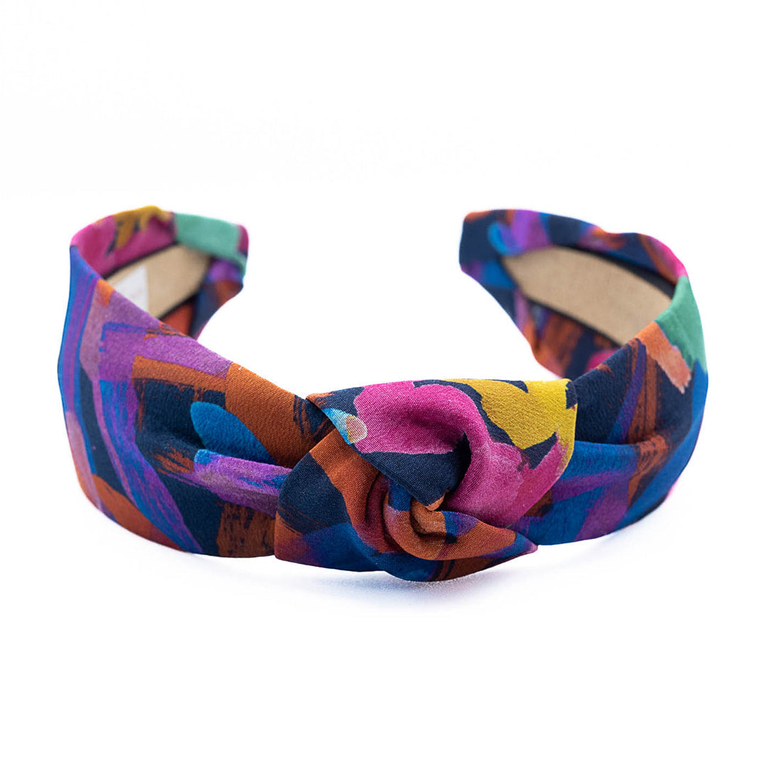 multicolor patterned headband on a white background