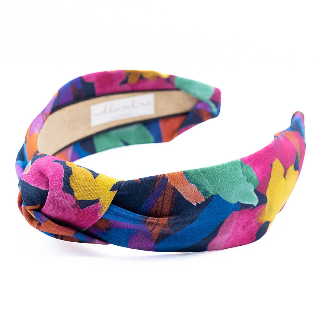 multicolor patterned headband on a white background