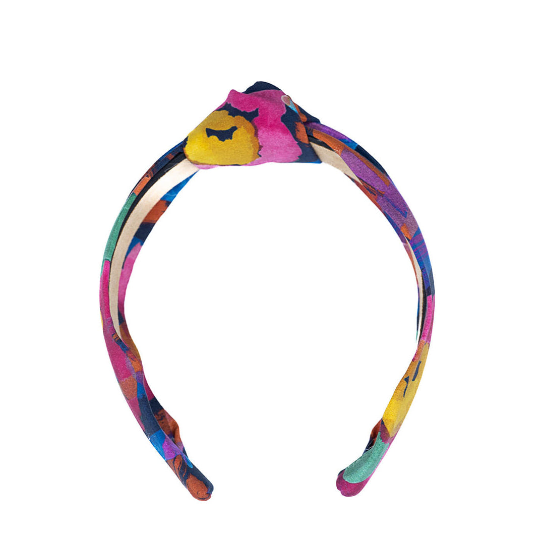multicolor patterned headband on a white background