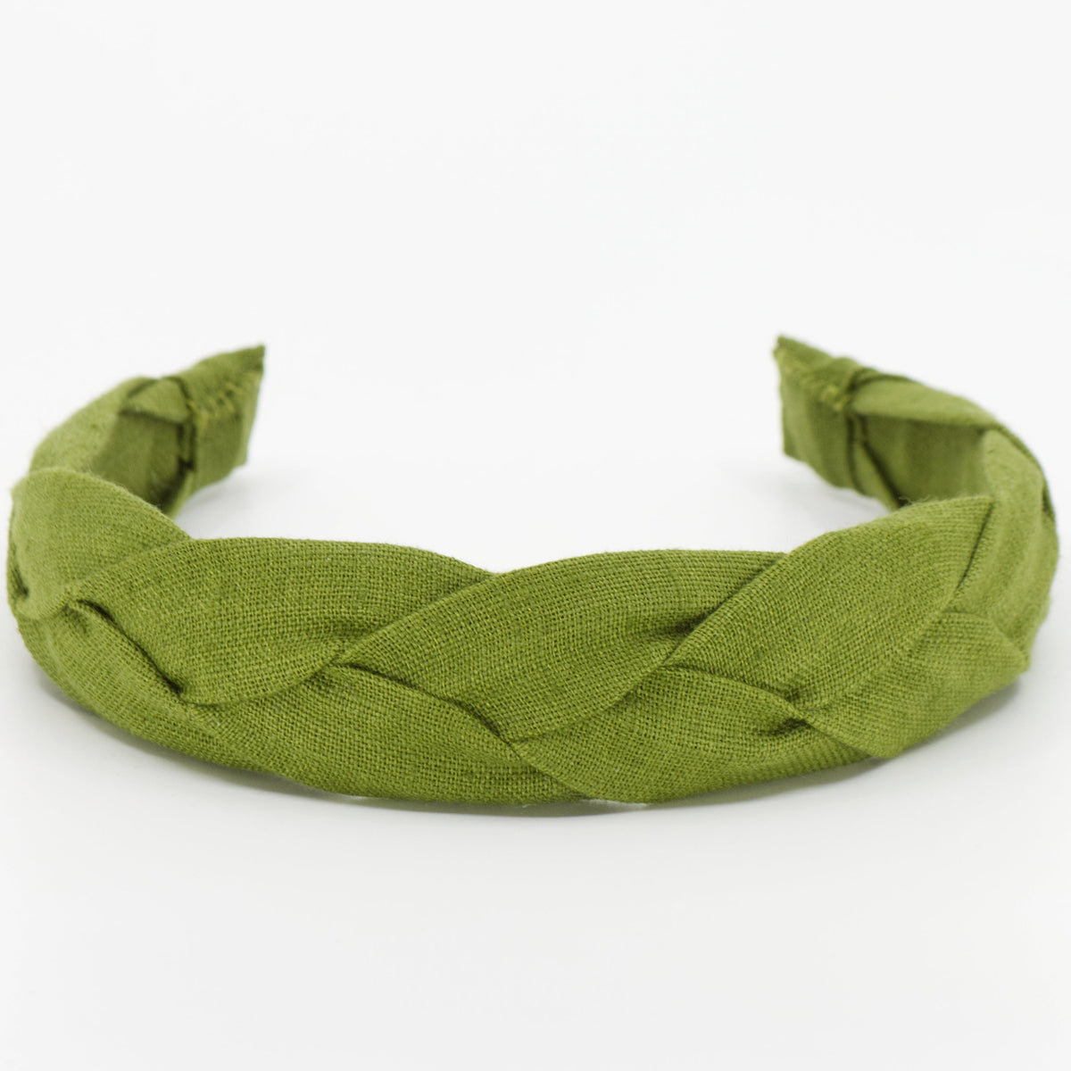 An olive green braided fabric headband photographed on a clean white background.