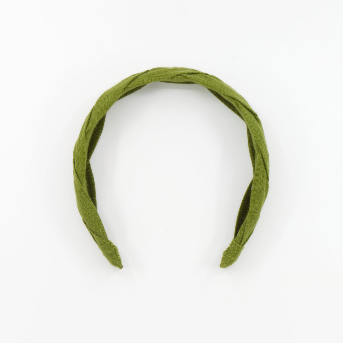 An olive green braided fabric headband photographed on a clean white background.