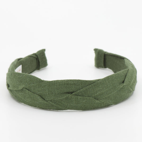 A pine green braided fabric headband shown on a plain white background.