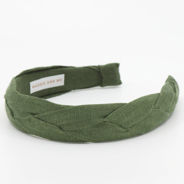 Pine green braided headband made with European linen on a white background with MADDIE AND ME tag.