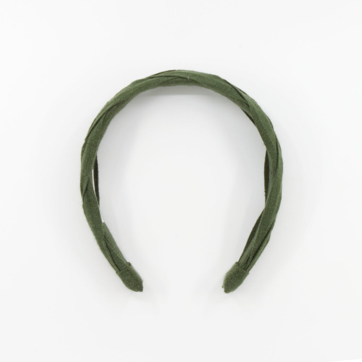 An olive green braided fabric headband photographed on a clean white background.