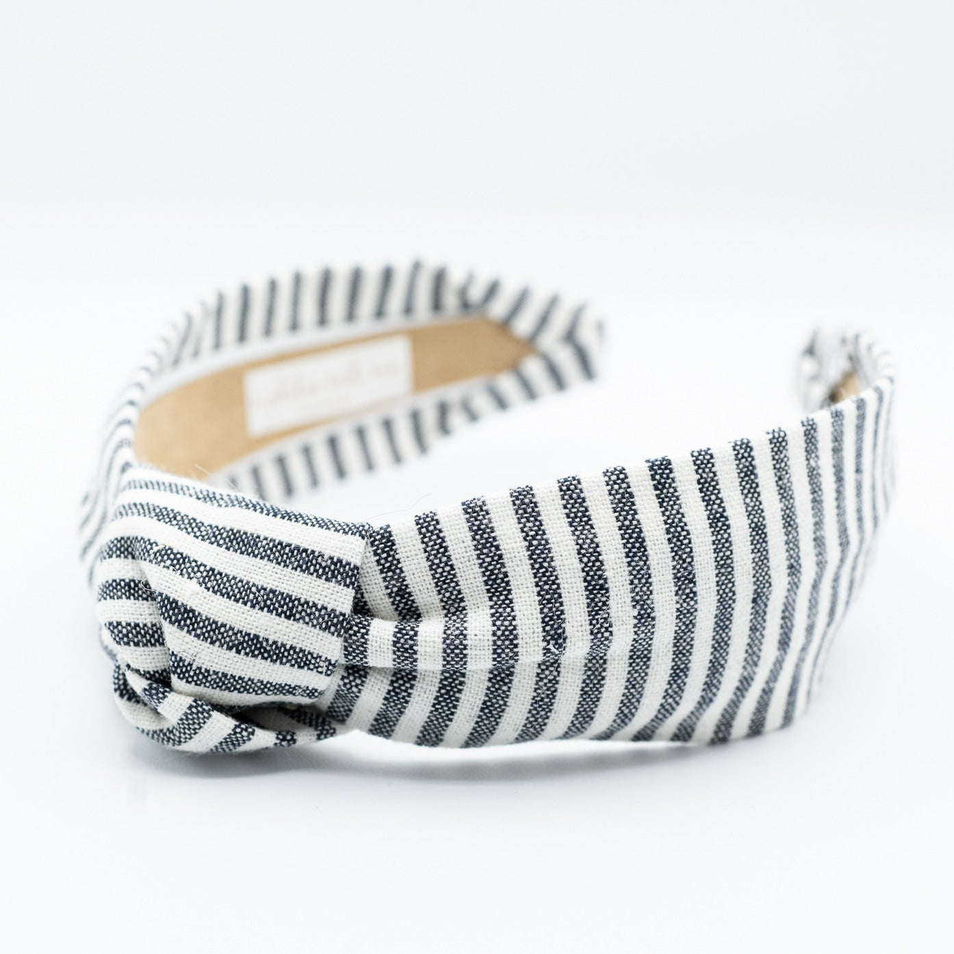 stripe knotted headband on a white background